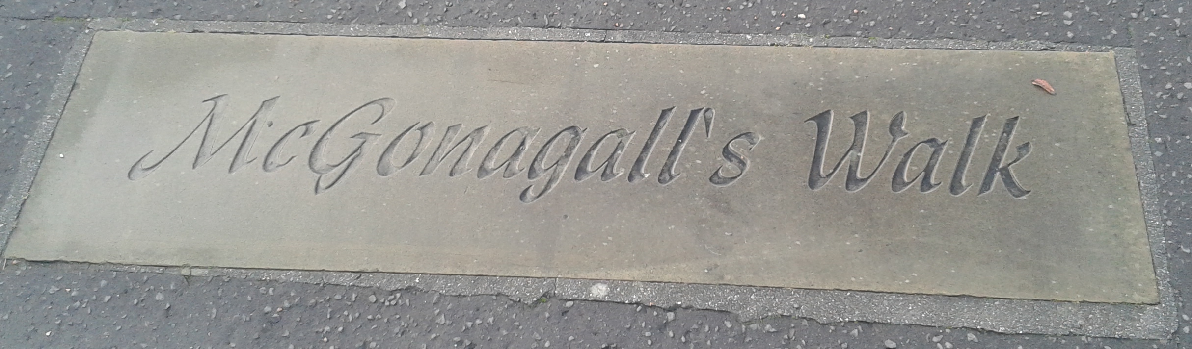 Plaque on the ground saying "McGonagall's Walk"