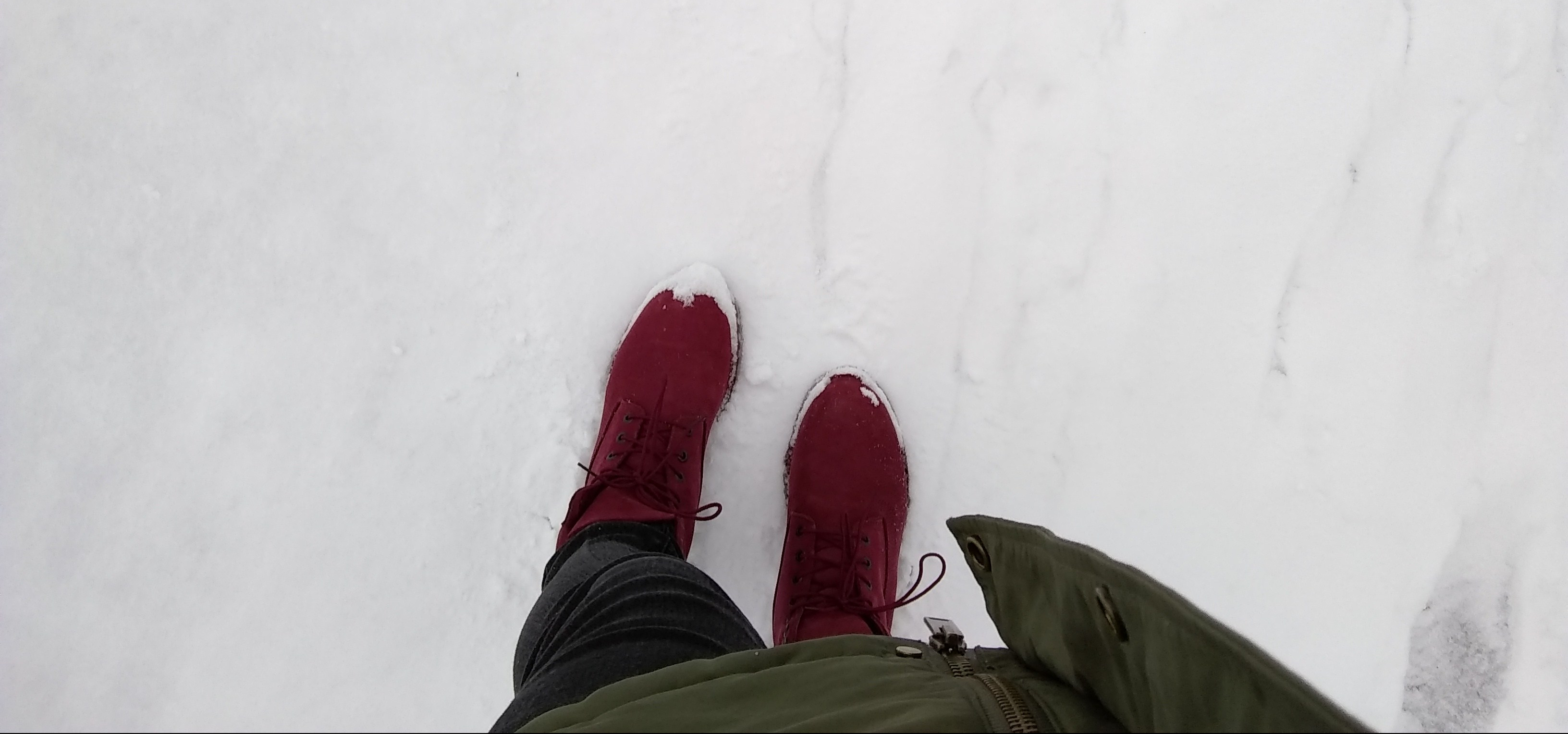 Walking on snow with boots.