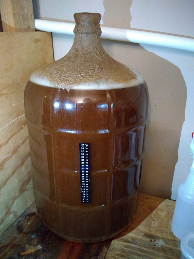 The fermentor with the stop off, the top is covered by dried foam and it doesn't look great.