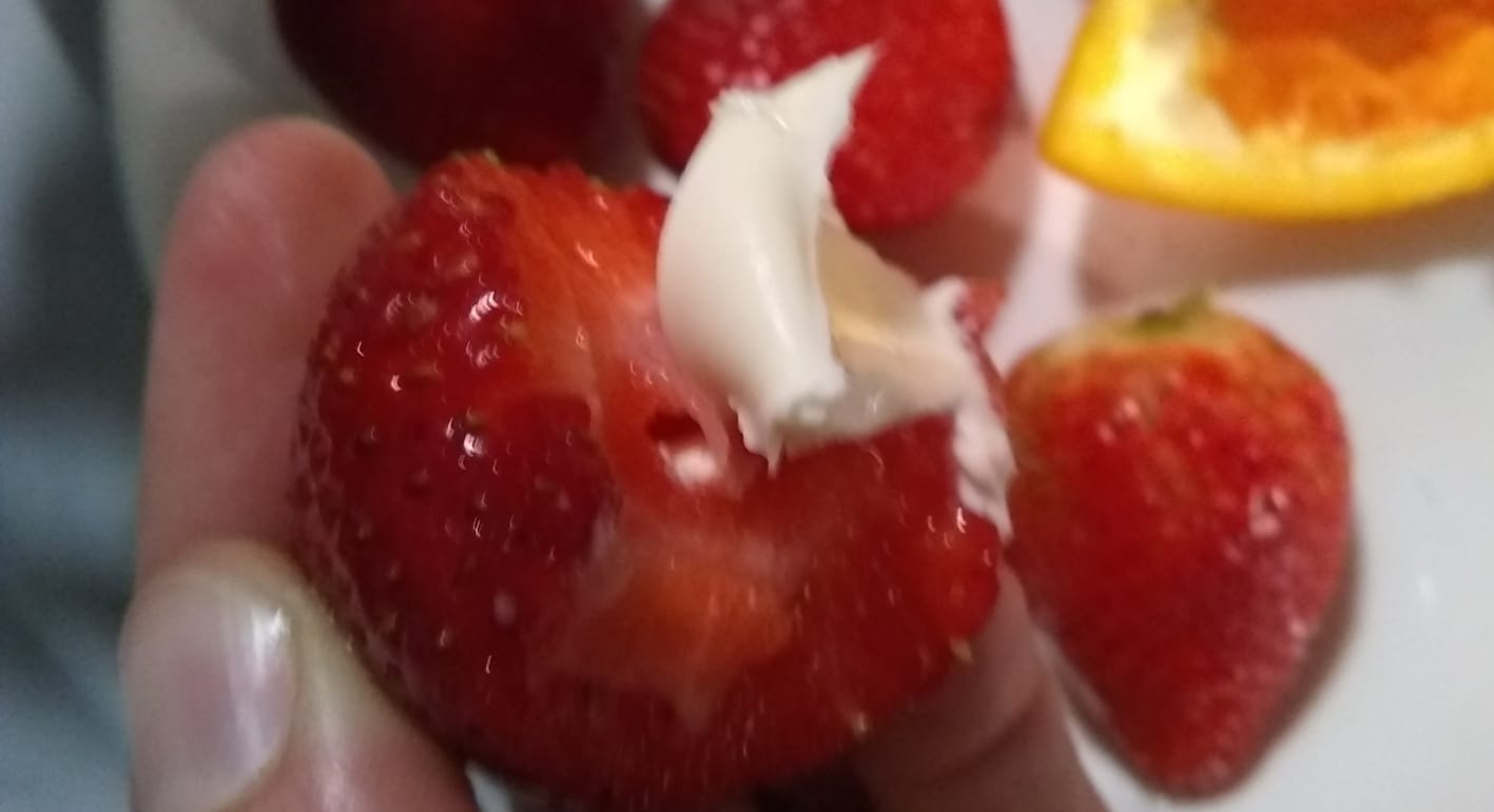 Strawberry and a dollop of cream cheese