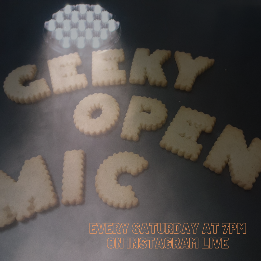 Cookies Spelling Out "Geeky Open Mic" under a spotlight