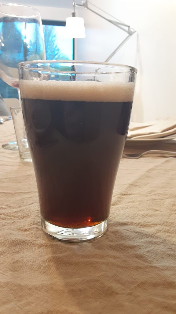 Glass of a dark brown beer