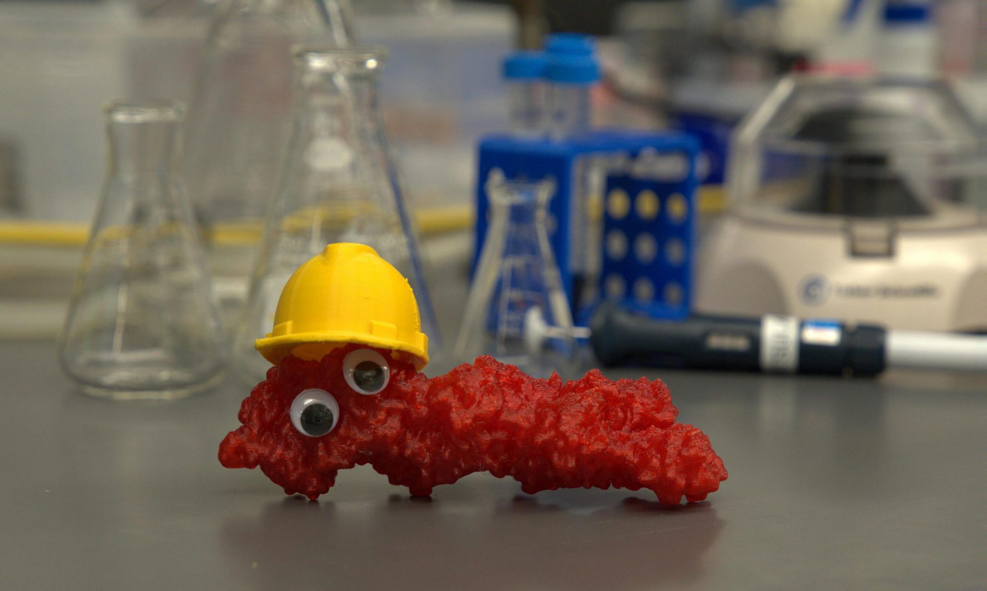 Image of a 3D printed actin filament wearing a little construction hat